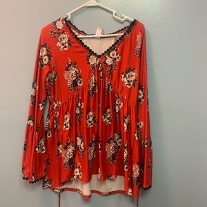 Red floral blouse